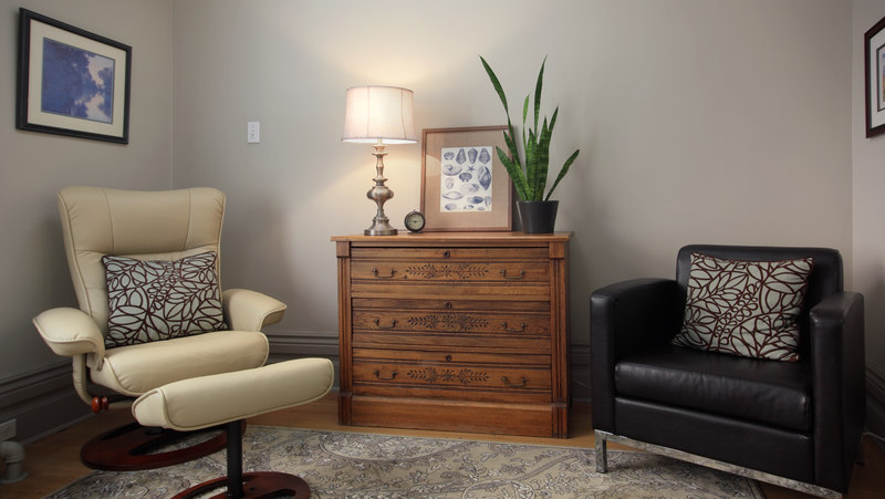 Inside the office of Dr. McDermid, Clinical Psychologist. Quaint office space a walk from Victoria park and Richmond Row. Nicely furnished room. Good light. Comfortable chairs.